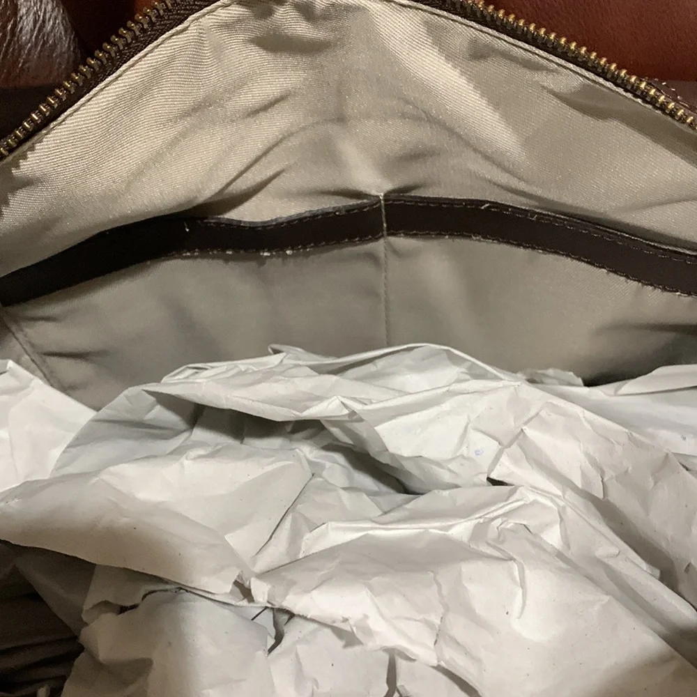 In Pell leather Duffel bag. Color: Brown, Made in Italy